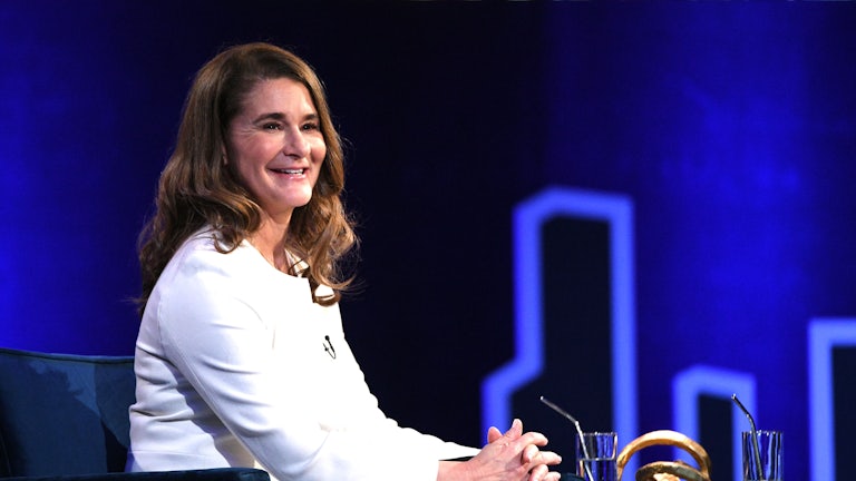 A smiling Melinda Gates glances out at the audience during an interview with Oprah Winfrey