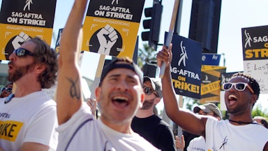 SAG-AFTRA members and supporters chant outside Paramount Studios on day 118 of their strike against the Hollywood studios on November 8, 2023 in Los Angeles, California.