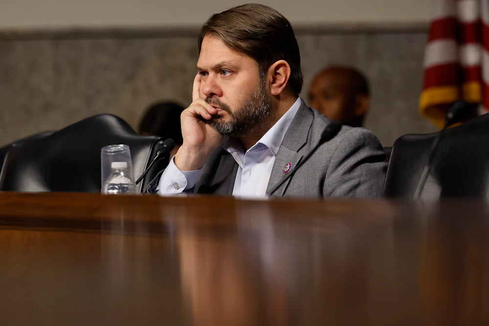 Arizona Representative Ruben Gallego listens during a hearing.