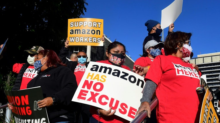 Union leaders in Los Angeles, California, are joined by community group representatives, elected officials and social activists for a rally in support of Alabama Amazon workers' unionization efforts