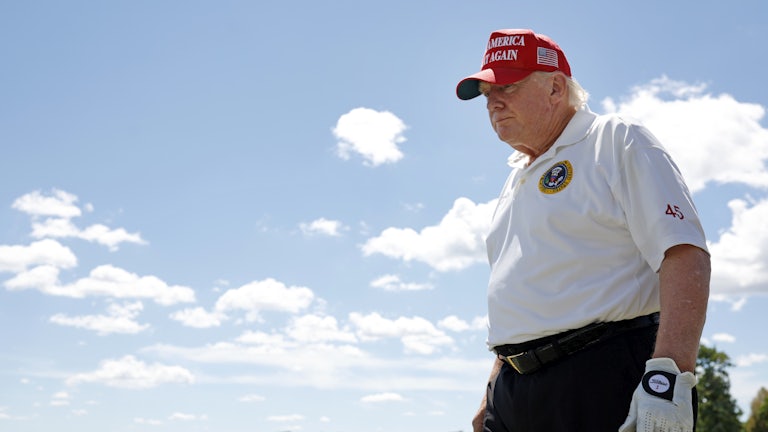 Former U.S. President Donald Trump walks the driving range during day two of the LIV Golf Invitational at his Bedminster, NJ resort.