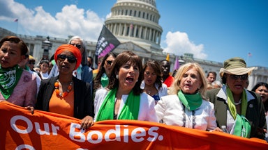 Democratic House members Ilhan Omar, Jackie Speier, Carolyn Maloney, and Alma Adams march toward the US Supreme Court during a July protest.