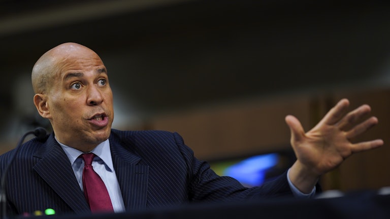Senator Cory Booker gestures as he speaks at a hearing on Capitol Hill.