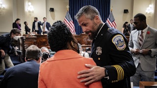 Officer Michael Fanone greets Representative Sheila Jackson-Lee during a hearing of the January 6th commission.