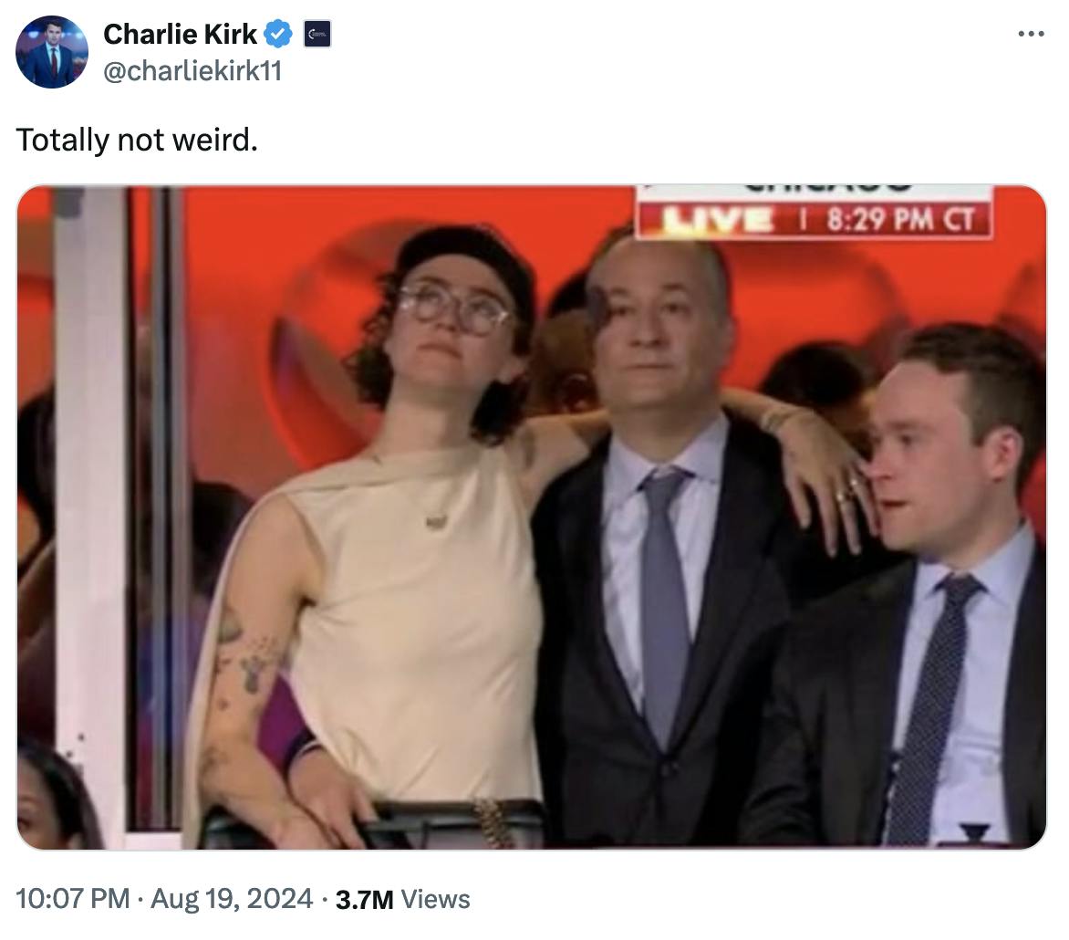 Twitter screenshot Charlie Kirk @charliekirk11: Totally not weird. (photo of Ella Emhoff draping an arm over Dough Emhoff's shoulders) 