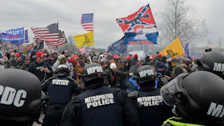 Trump supporters attack police as they storm the US Capitol on January 6, 2021