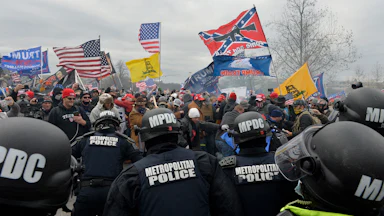 Trump supporters attack police as they storm the US Capitol on January 6, 2021