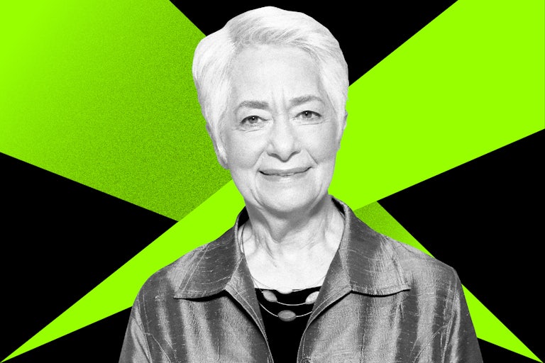 Heather Booth in front of a black and green background