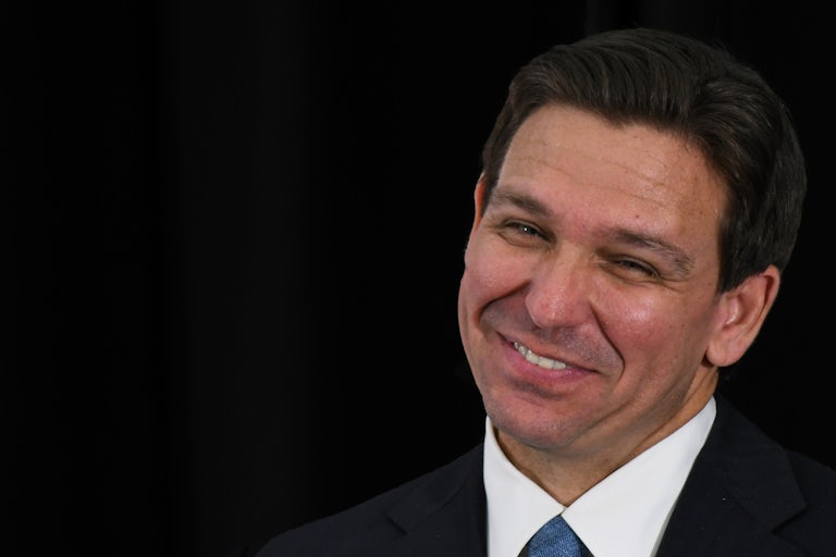 Ron DeSantis makes a weird face (he's trying to smile)