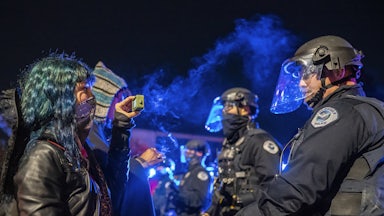 A Black Lives Matter protester films the police at an encounter in Washington state.