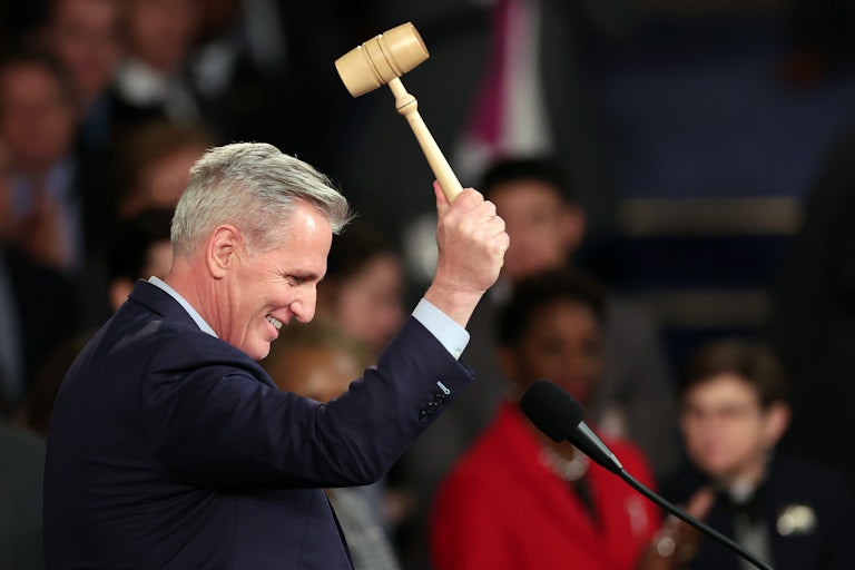 Kevin McCarthy smiles with a gavel in his hand