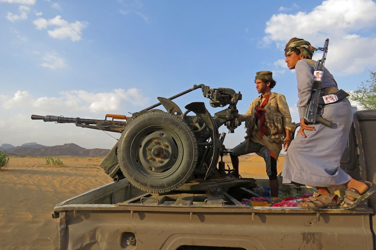 Fighters loyal to Yemen’s Saudi-backed government man a position near the al-Jawba frontline, facing Iran-backed Houthi rebels, in the country's northeastern province of Marib.