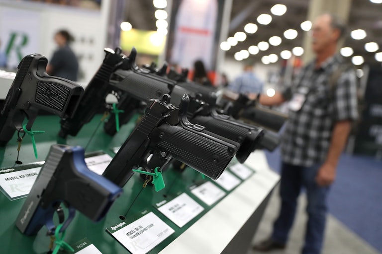 Remington handguns are displayed during the NRA Annual Meeting.