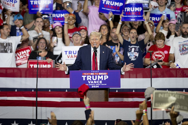 Donald Trump gestures as he speaks during a campaign rally