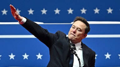 Elon Musk appears to do the Nazi salute at a lectern during Trump’s inaugural parade