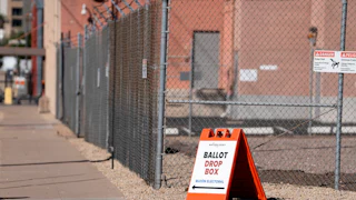 A sign for a ballot drop box at the Maricopa County Tabulation and Election Center in Phoenix, Arizona.