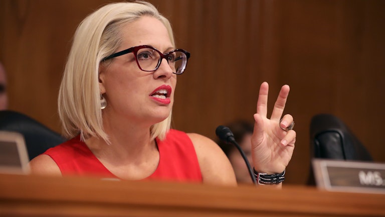 Kyrsten Sinema questions witnesses during a Congressional hearing on Capitol Hill