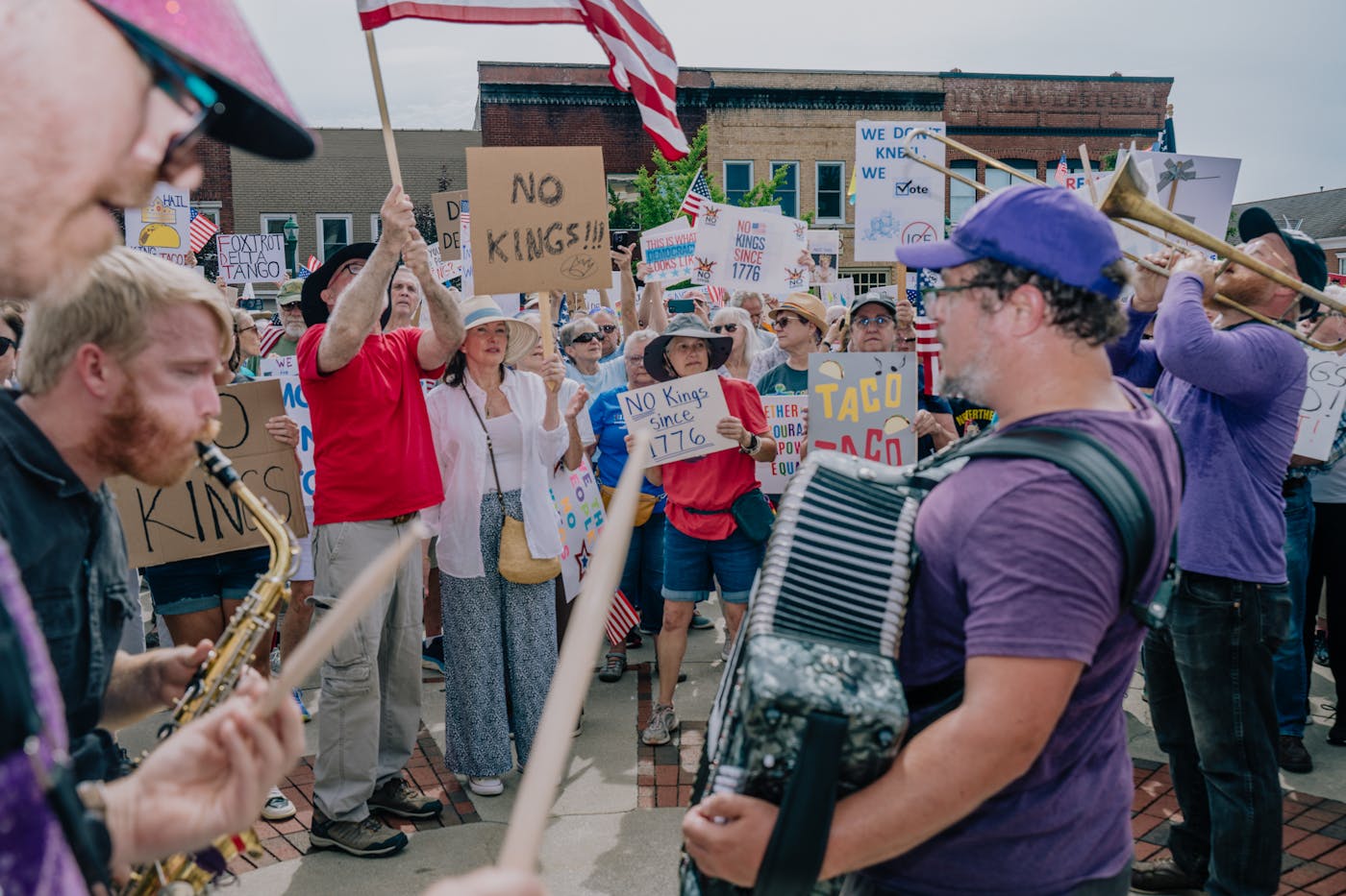 No Kings protesters are joined in song by a group of local musicians in Hendersonville.