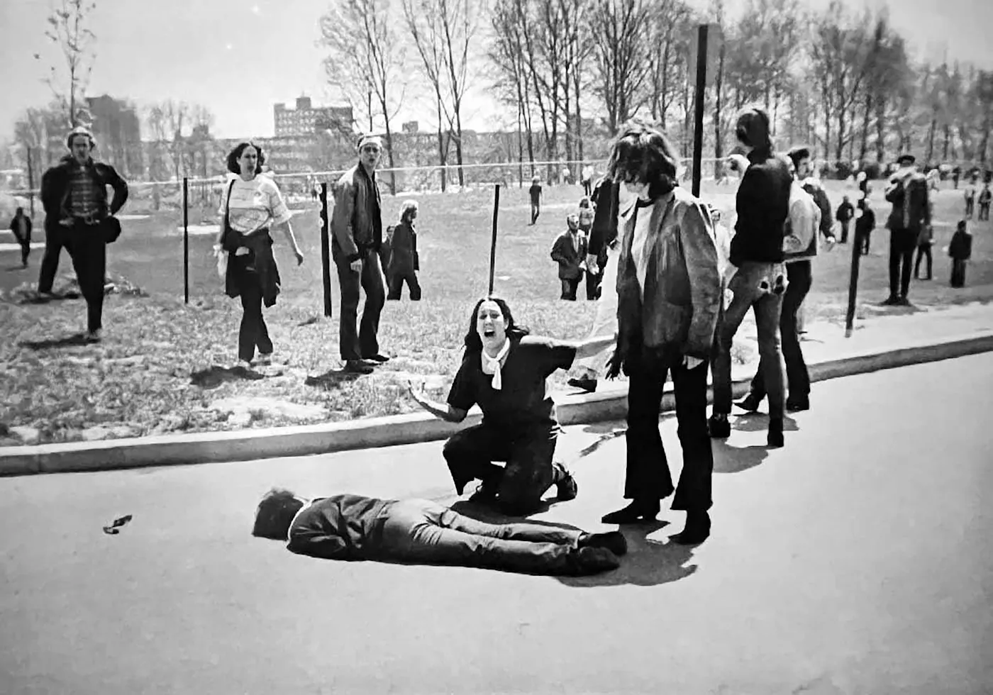 Mary Ann Vecchio kneels over the body of over a student's body on the ground, screaming in anguish, after Ohio National Guard troops opened fire on student protesters at Kent State University campus, May 4, 1970.