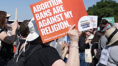 A protester carries a sign as they attend the "Jewish Rally for Abortion Justice" rally on May 17, 2022 in Washington, DC.