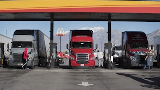 truck drivers at a gas station