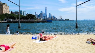 Sunbathers on a beach in New York City