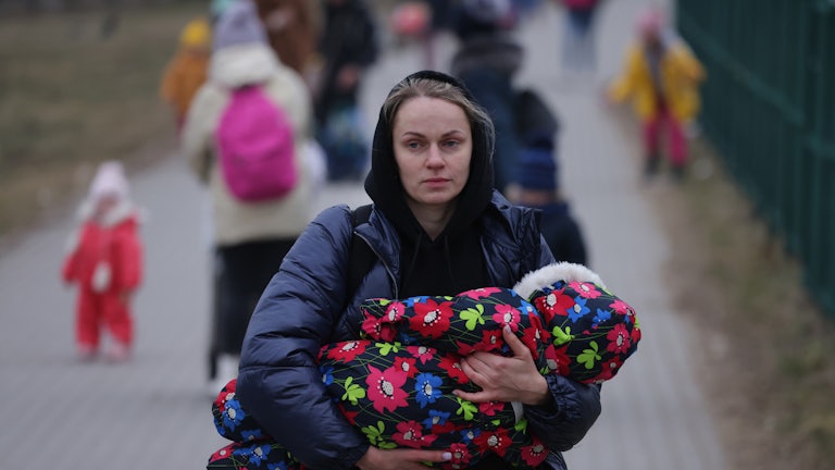 Mother and infant from Ukraine at the Medyka border crossing