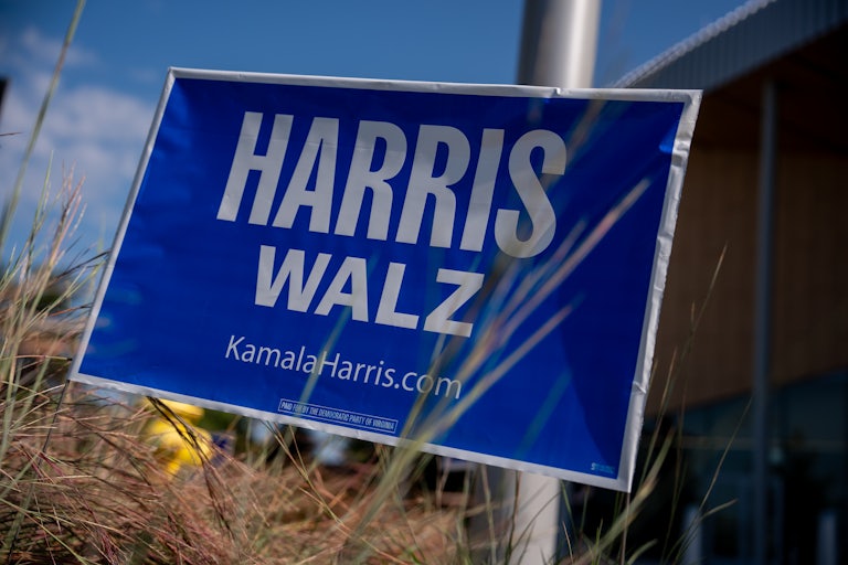 A campaign sign for Kamala Harris and Tim Walz