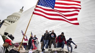 Trump supporters try to storm the US Capitol in Washington D.C on January 6, 2021.