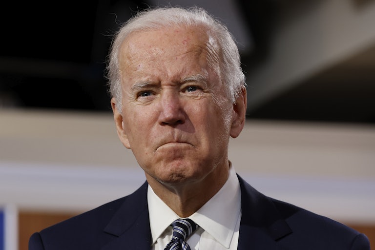 A close up of a stern President Joe Biden.