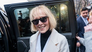 E. Jean Carroll smiles