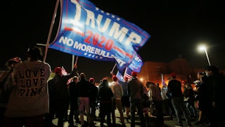 Supporters of President Donald Trump demonstrate in front of the Maricopa County Elections Department office on Election Day.