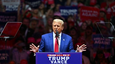 Donald Trump speaks with spread hands