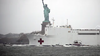 The emergency hospital ship, USNS Comfort, leaving New York in April 2020