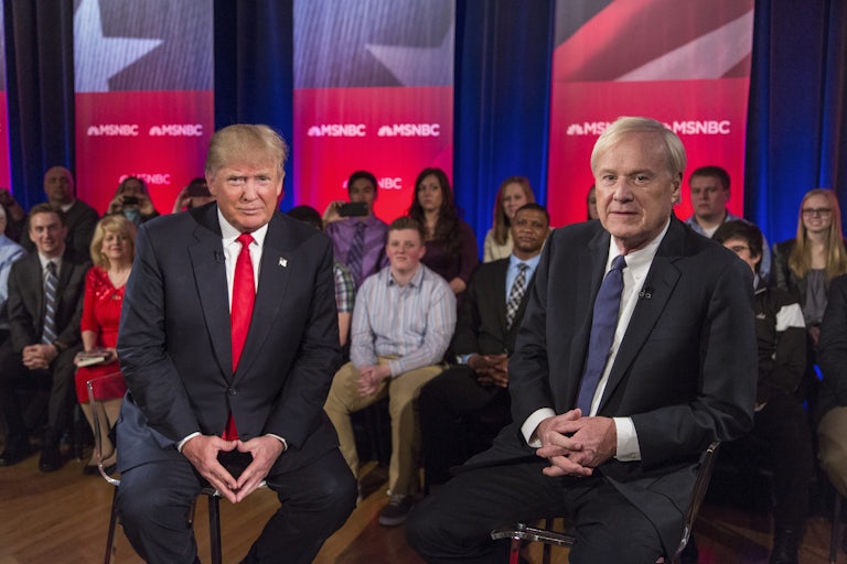 Donald Trump and MSNBC's Chris Matthews sit on stage at a town hall event in Wisconsin.