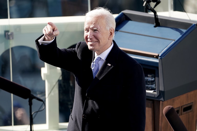 President Joe Biden points after taking the oath of office during the presidential inauguration.