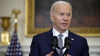 President Joe Biden speaks at a podium