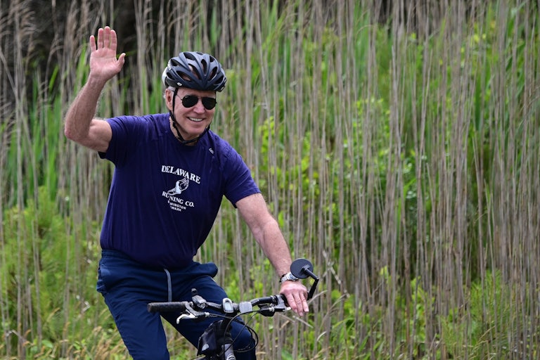 President Joe Biden riding a bike