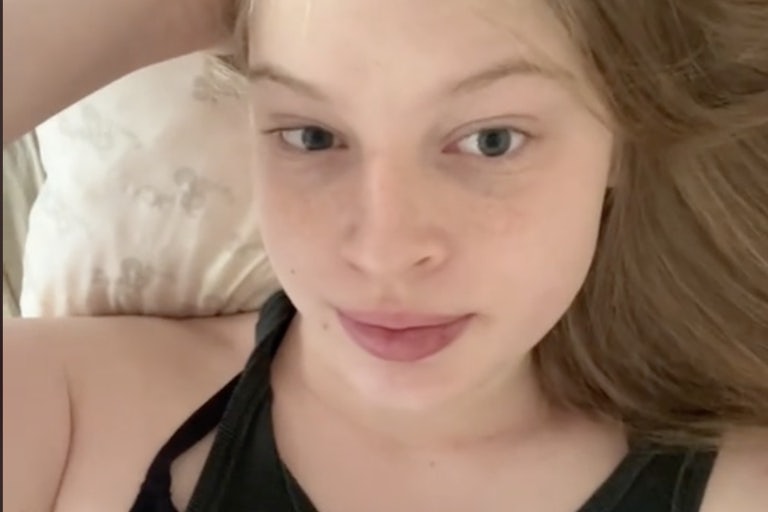 Vivian Wilson holding her hand in her hair