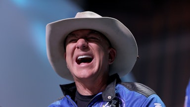 VAN HORN, TEXAS - JULY 20: Jeff Bezos laughs as he speaks about his flight on Blue Origin’s New Shepard into space during a press conference.