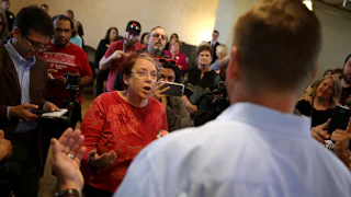 A constituent talks with then-Congressman Jeff Denham, a California Republican