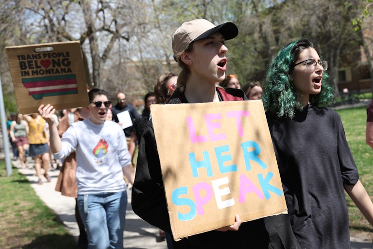 Transgender rights activists march through the University of Montana campus in Missoula
