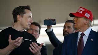 Elon Musk speaks with U.S. President-elect Donald Trump at a viewing of the launch of the sixth test flight of the SpaceX Starship rocket.