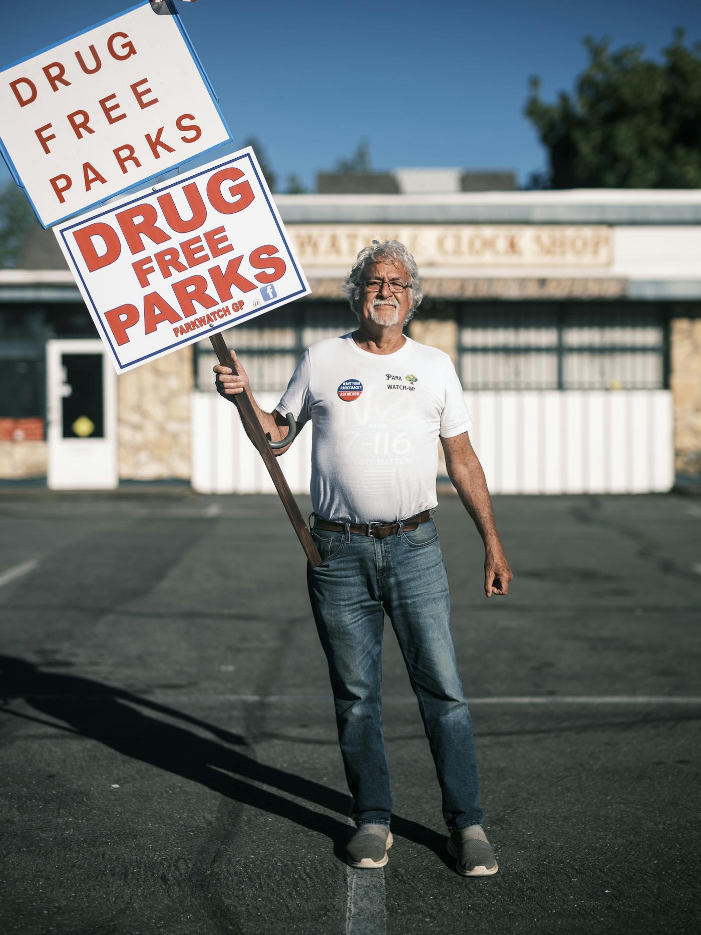 Bryan Welden a member of Grants Pass Park Watch, protested outside of the meeting