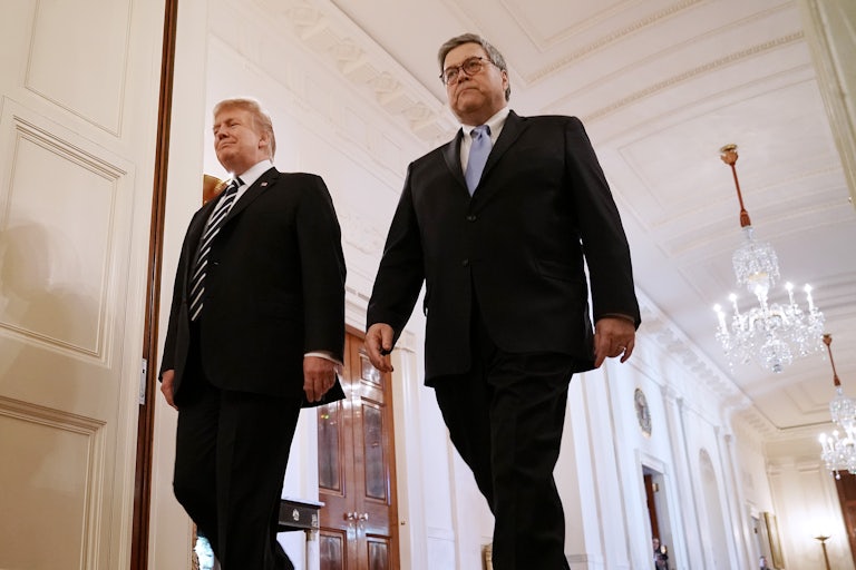 Donald Trump and William Barr walk alongside one another.