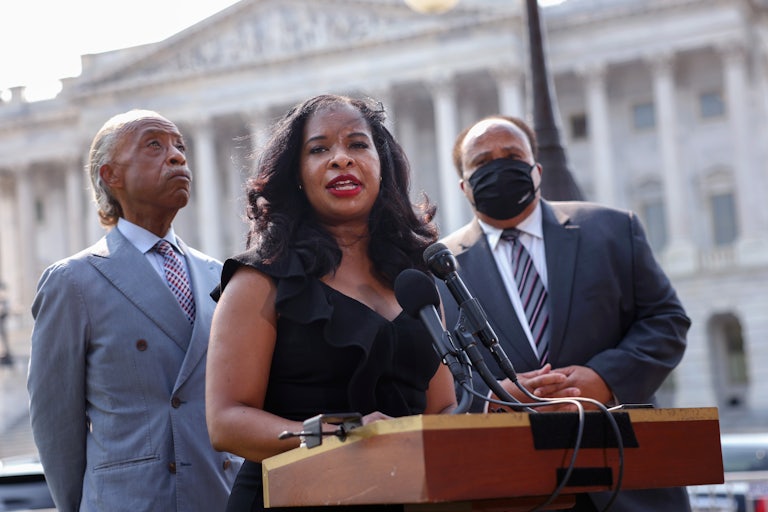 Civil rights leader Arndrea Waters King speaks alongside Rev. Al Sharpton and Martin Luther King III at a press conference on voting rights outside of the U.S. Capitol.