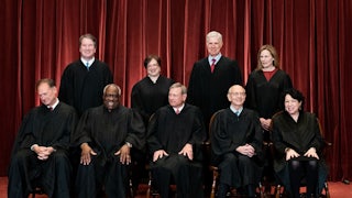 The nine justices of the Supreme Court pose for a picture.