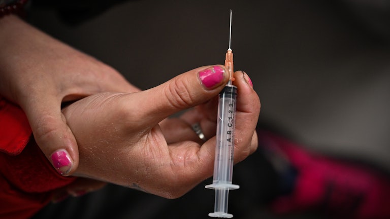 A drug user inside a "Safe Consumption" van