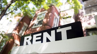A sign advertises an apartment for rent on Capitol Hil.