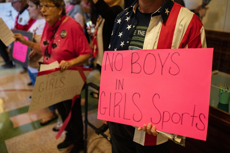 protesters at the Texas State Capitol support a bill banning trans student athletes